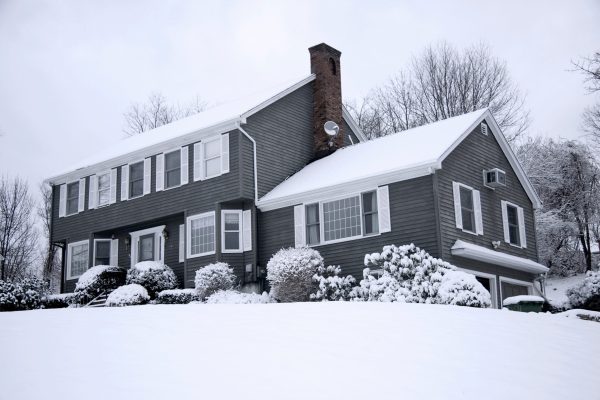 Traditional American colonial style house in winter